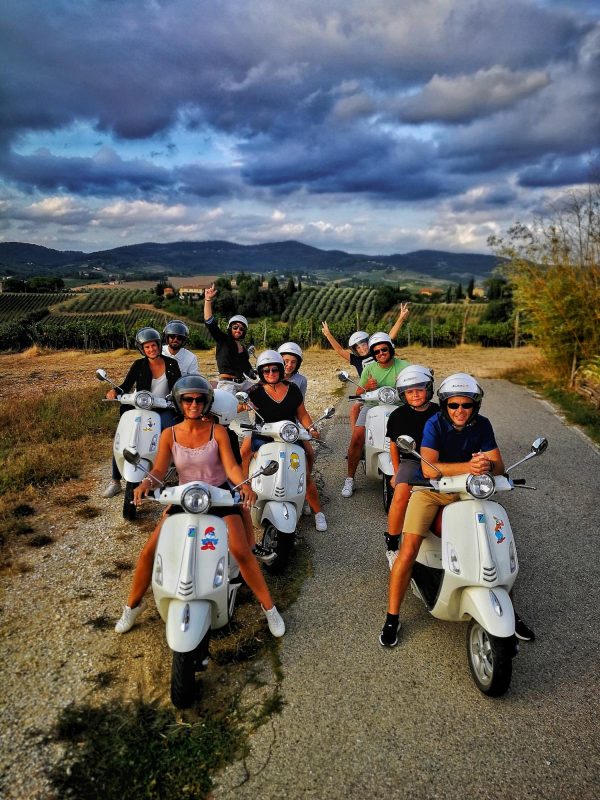 Group riding Vespas during Tour de Vespa at De Stilte Tulbagh